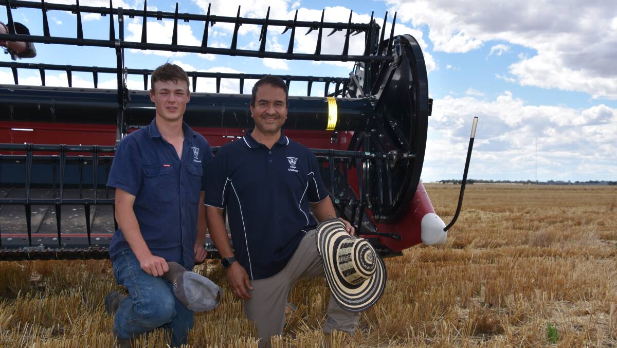 Liam Forde (left) has gained valuable experience working alongside Longerenong College farm manager Guillermo Sierra at harvest. Photo by Gregor Heard.