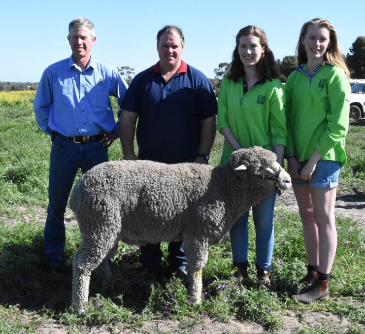 Darren Cameron, Brad Blackwood, Nhill, Issy and Lily Cameron with the top price Poll Merino at last week's Koonik / Mitre Rock ram sale.