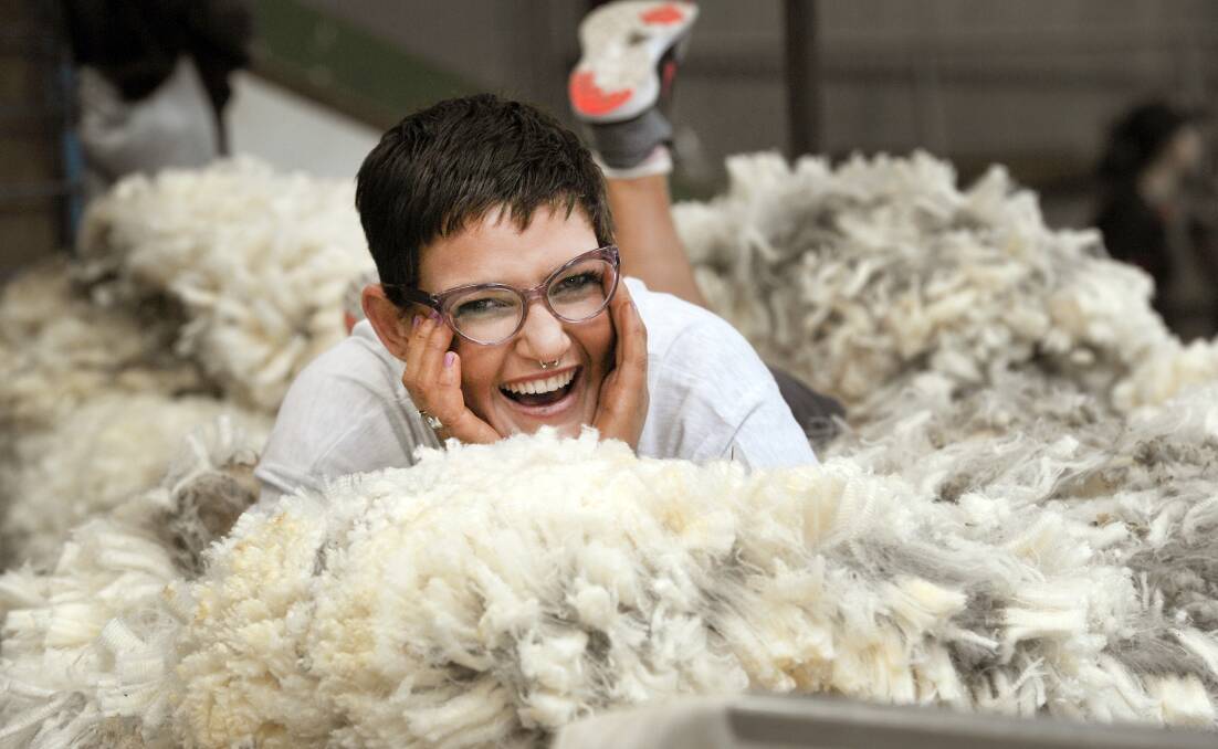 TAKING A BREAK: Bianca Cobb takes a break during the shearing competition at the 2016 Horsham Show. Picture: PAUL CARRACHER