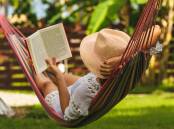 DELIGHT: There's not much better than spending a lazy summer's afternoon reading a page turner. Photo: Shutterstock