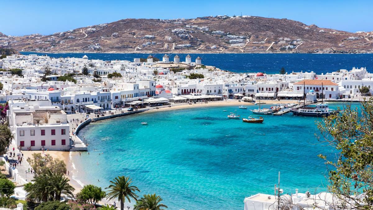 Grab a travelling companion and bag a bargain on tours in Europe, with a beautiful island hopping experience taking you to Mykonos. Picture: Shutterstock
