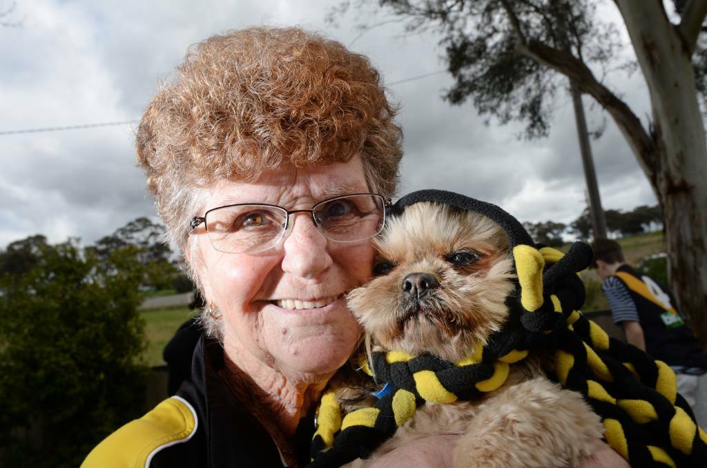 Dustin Martin's nan Lois Knight with Milly. Photo: Darren Howe