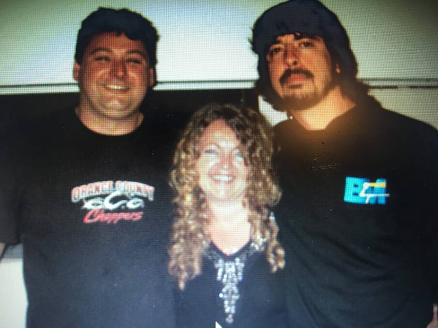 Brant Webb and wife Rachel with Foo Fighters frontman Dave Grohl. 