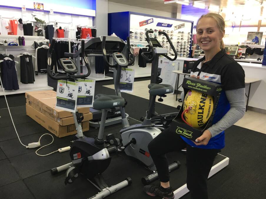 TAKING IT INSIDE: Lucinda Taylor of Intersport Horsham. Sports stores across the region have seen an increase in personal fitness equipment in the wake of gym closures. Picture: CONTRIBUTED 