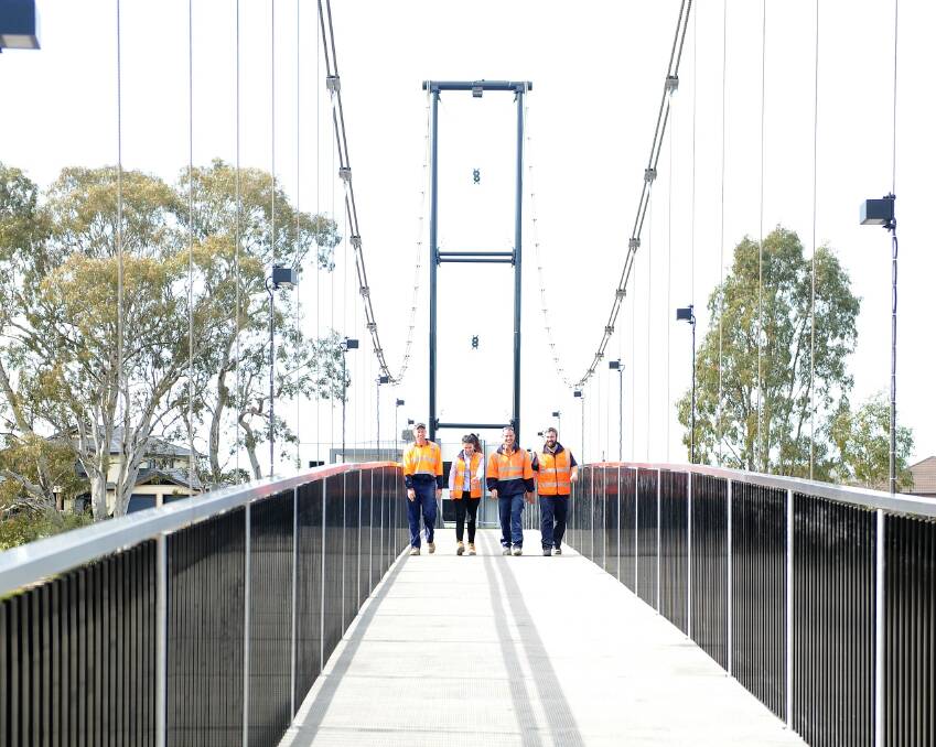 ACROSS THE RIVER: The pedestrian bridge that crosses the Wimmera River at Horsham has allowed people to easily use both side of the riverbank. 