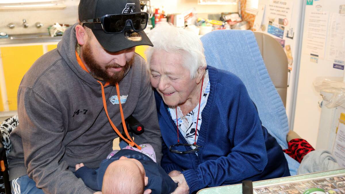 A FIRST MEETING: Jordy Ralph, left, "snuck" in so that Verna Pickford, 92, could meet her great-granddaughter, Harper for the first time. Pictures: TRISH RALPH