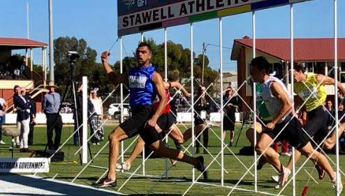 Dhruv Rodrigues-Chico realises he is a Stawell Gift champion Picture: courtesy @StawellGift Twitter