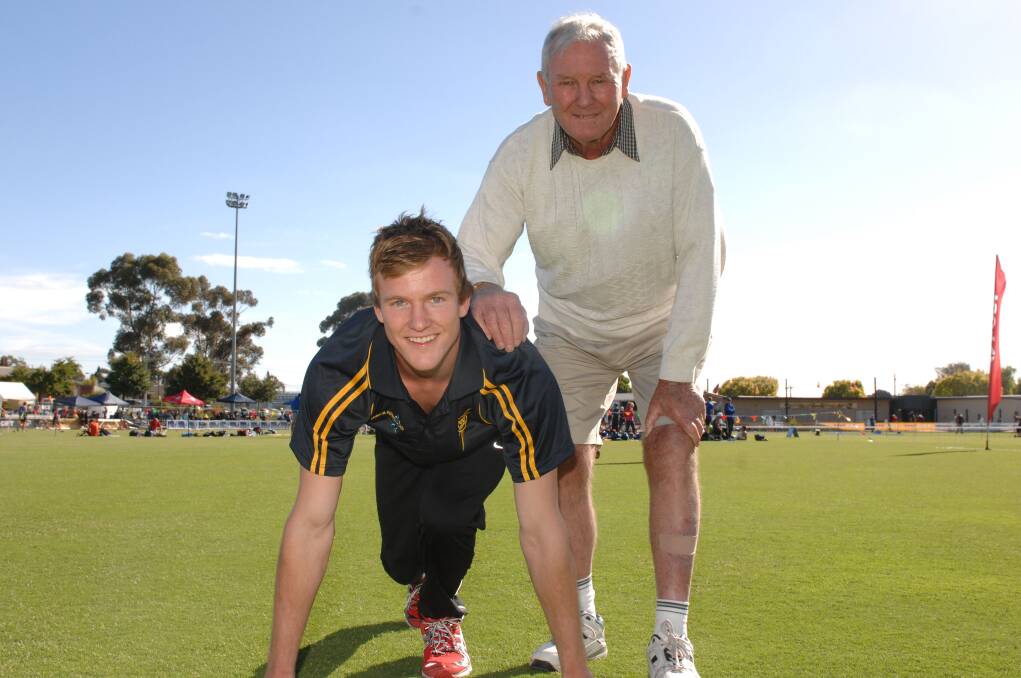 FAMILY RITUAL: Stawell Gift 2012 winner Matt Wiltshire with his grandfather John Wiltshire, who had been a sash favourite in 1958. 