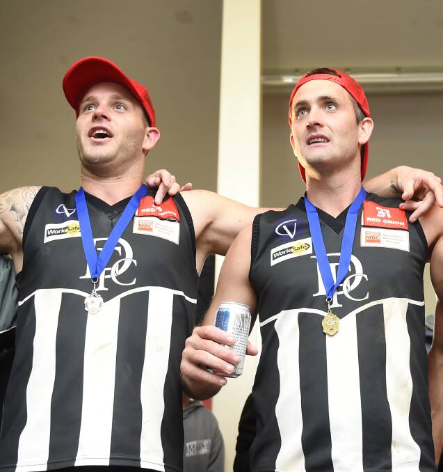 CELEBRATE: Jake Edwards with brother Jarrod are all smiles after Darley's 2015 Ballarat Football League premiership win.
