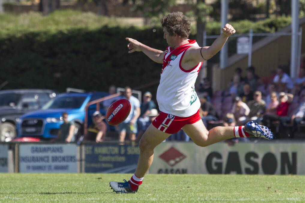 PENETRATING KICK: Jake Williamson in action for Ararat earlier in the season. Picture: Peter Pickering