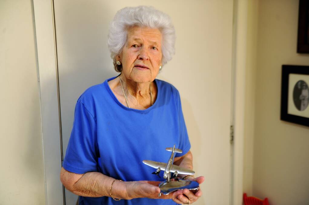 SIGNIFICANT CONTRIBUTION: Horsham resident Gwen Kelm with an aeroplane ashtray she made while working as an oxy-welder in Melbourne during World War Two. Pictures: ALEXANDER DARLING
