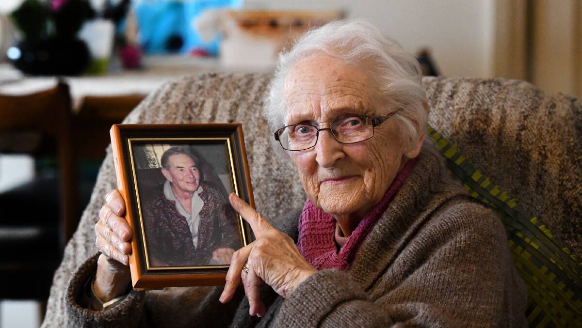 WAR WIDOW: Horsham's Jean Ladlow with a picture of late husband David. Mrs Ladlow receives support from Wimmera Legacy. Picture: SAMANTHA CAMARRI