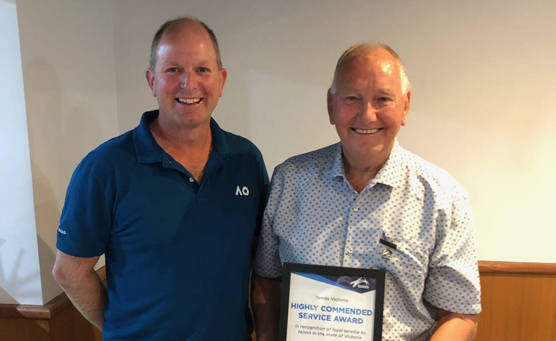 A LIFE ON THE COURT: Brian Breuer, committee member at Horsham's Central Park Tennis Club has received a Tennis Victoria award after 55 years of service. He is pictured here with Tennis Victoria participation leader Andrew Cronin. Picture: CONTRIBUTED