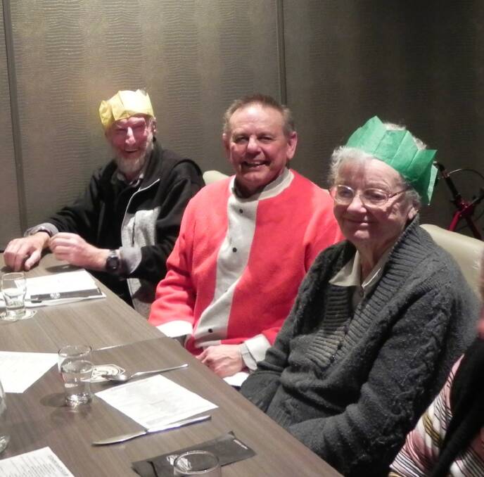 JOINT CONCERNS: Wayne Lentsment, centre, with members of Horsham's Arthritis Peer Support group at their Christmas in July function. Picture: CONTRIBUTED
