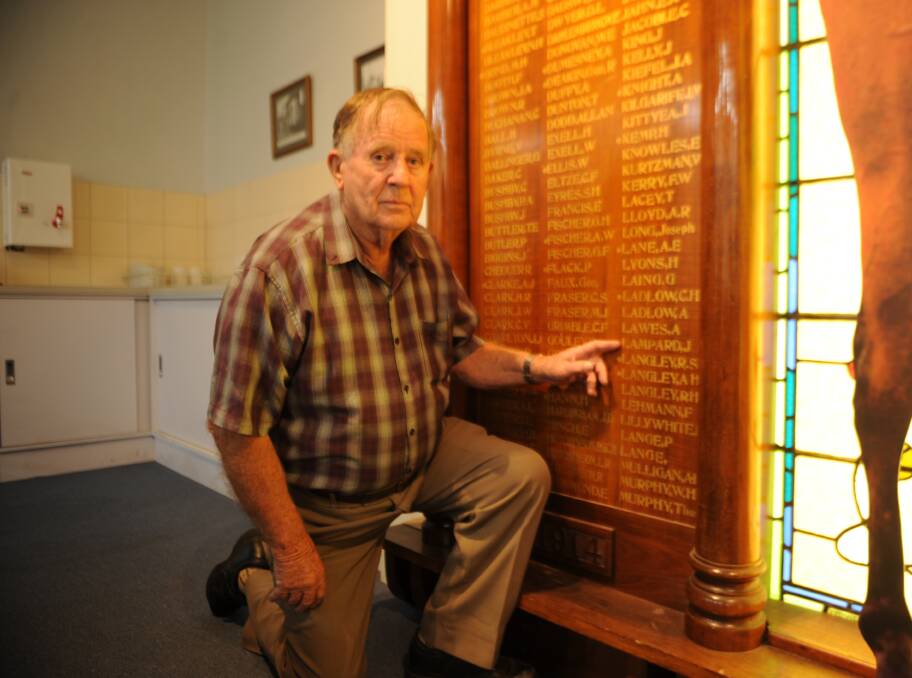 HERITAGE: Brian Lampard points to the name of his father James on a memorial wall at Horsham RSL club. Picture: ALEXANDER DARLING
