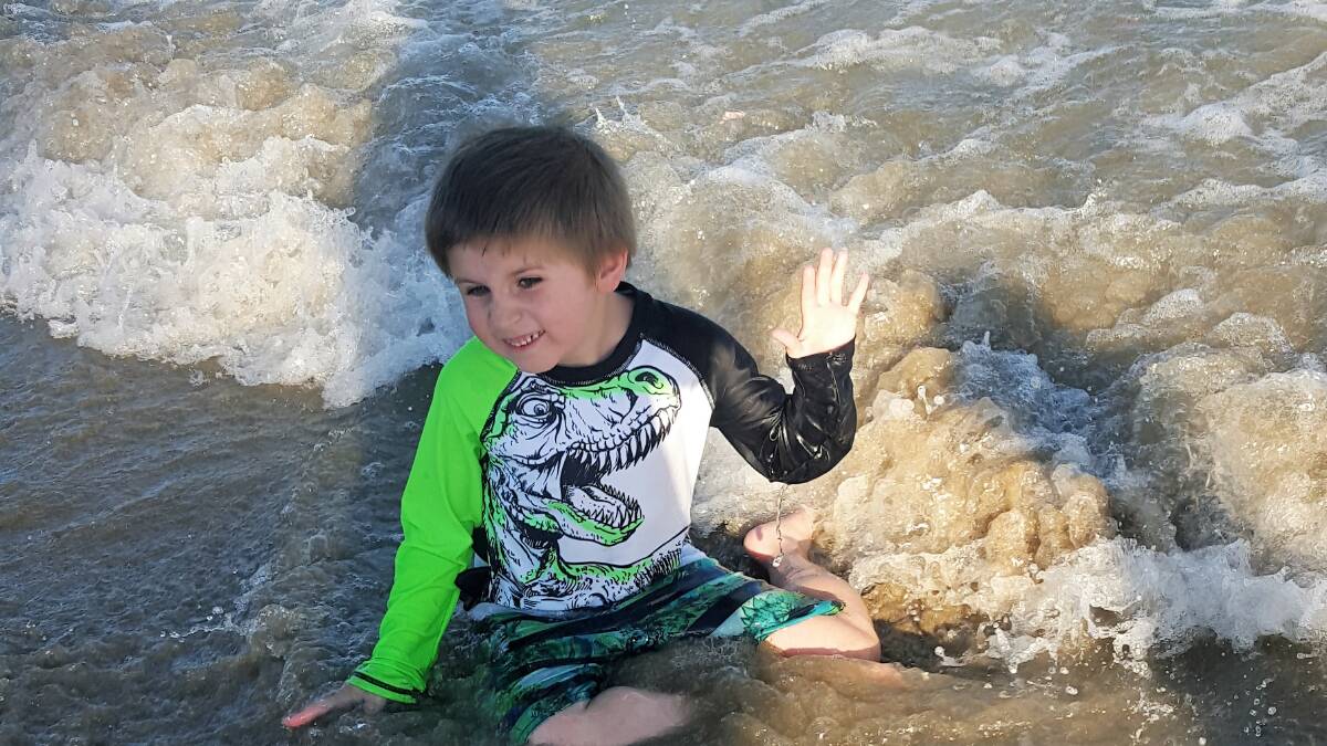 Seven-year-old Seth loves the beach. Photo supplied.