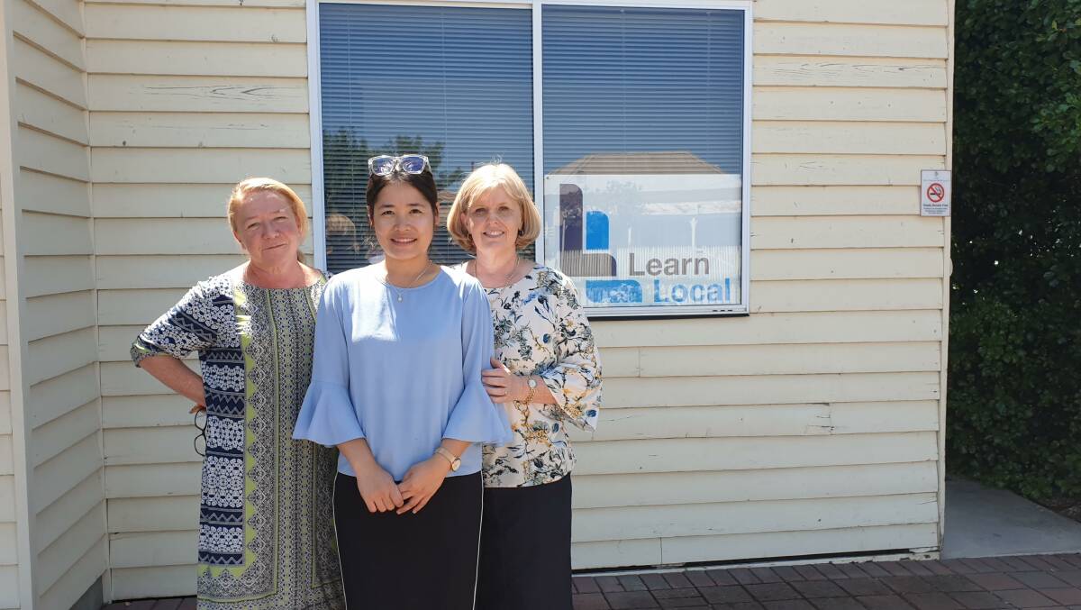 THE JOB'S NOT DONE: Annette Creek, Melissa Powell and Thablay Sher out the front of the Nhill Learning Centre. Picture: CONTRIBUTED