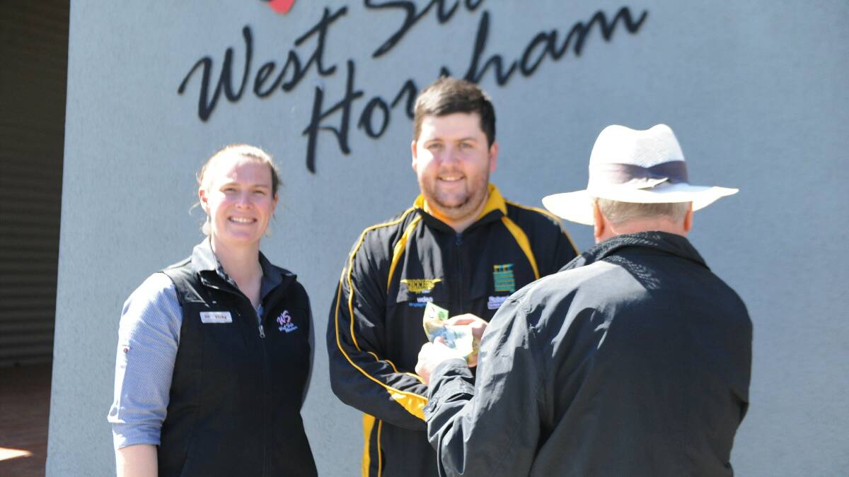 ACT OF CHARITY: West Side Horsham accounts manager Vicky McClure with Access All Abilities program manager Nic Baird, who received a combined $750 from Wimmera Wally and West Side on Tuesday. Picture: ALEXANDER DARLING
