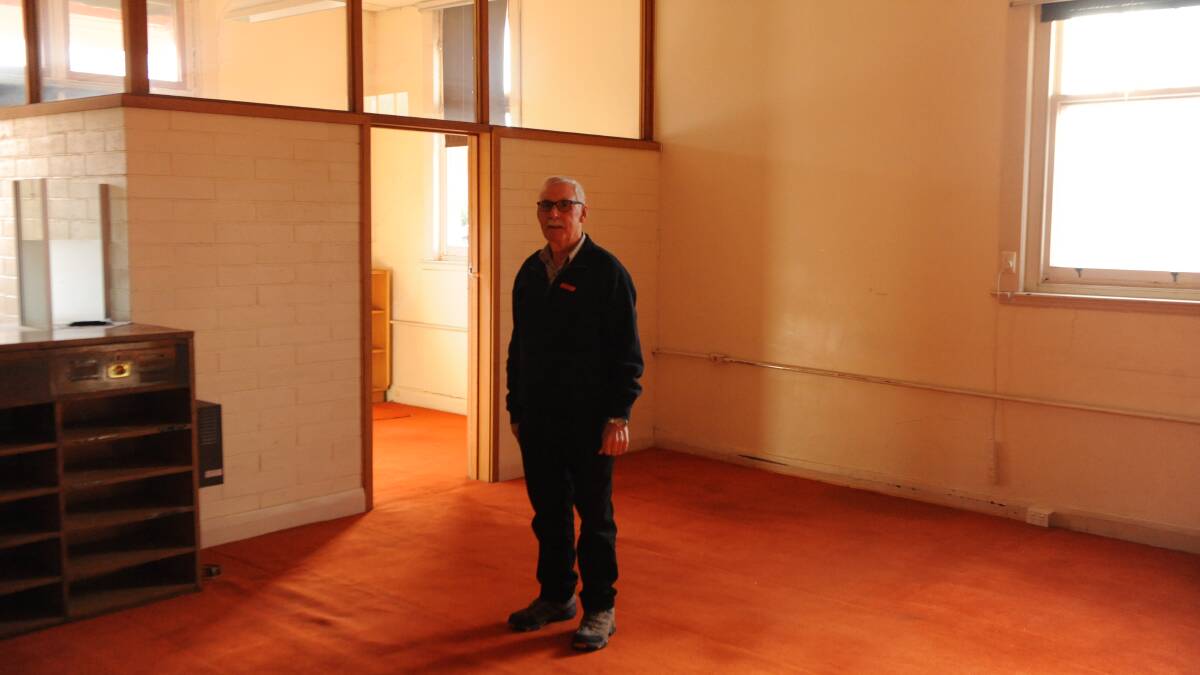 TOWN MEMORIES: Dimboola Real Esate Agent Garry Price in the downstairs office spaces of 48 Victoria Street.