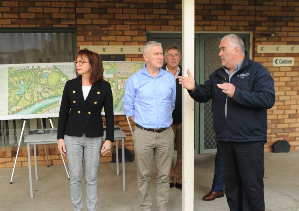 Horsham Regional Livestock Exchange Paul Christopher, right explains how the facility works to Member for Mallee Anne Webster and Deputy Prime Minister Michael McCormack. Picture: ALEXANDER DARLING