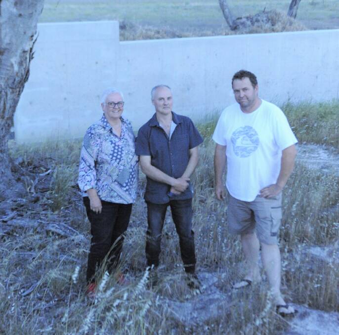 WEIR-Y OF THE SAGA: Kerry Walker, Keith Haustorfer and Brian Klowss with the new outlet. Picture: ALEXANDER DARLING