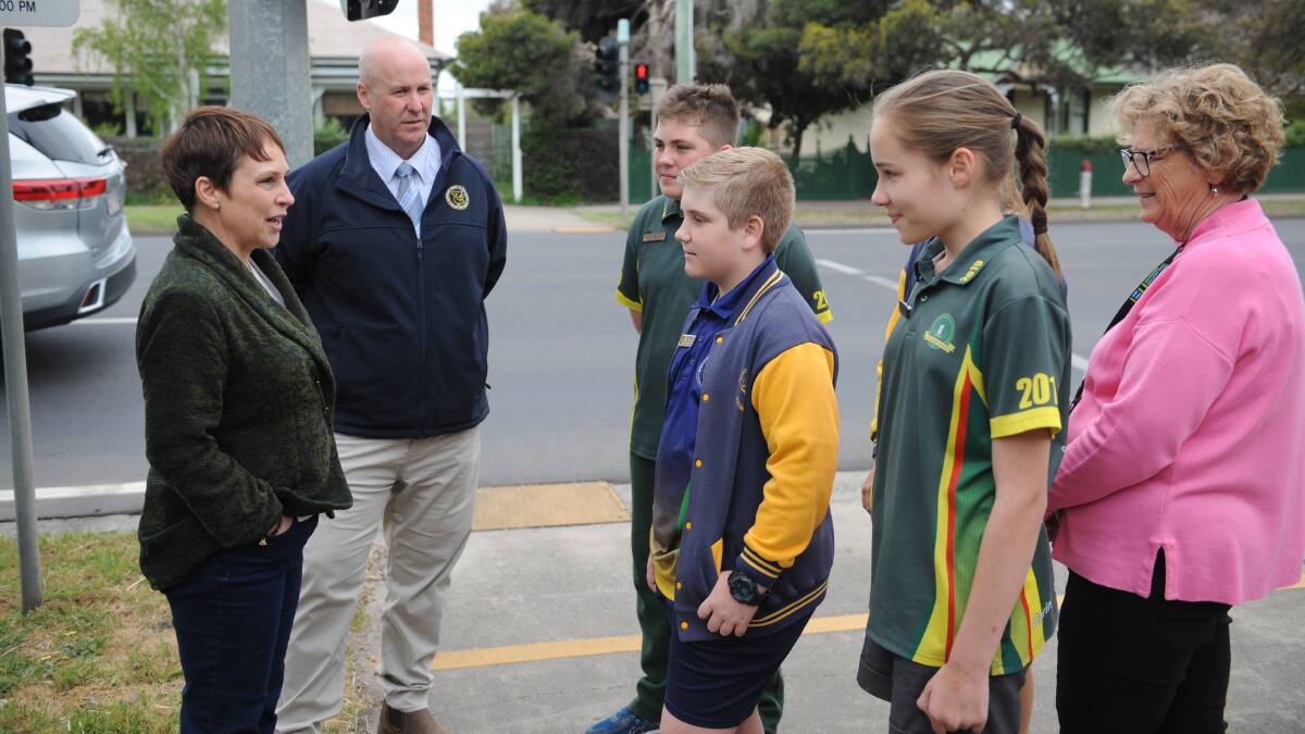BUSY AREA: Western Victoria MP Jaala Pulford, with Horsham West Haven Primary School principal Andrew Parry, talks to HWHPS captain Kai Dodson and Saints Michael and John's Primary School captains Grady McCourt and Grace Herman. SMJ Horsham Principal Andrea Cox watches on. Picture: ALEXANDER DARLING