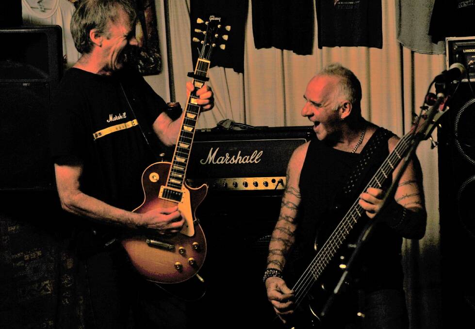 Guitarist Rod and Bassist John rock out.