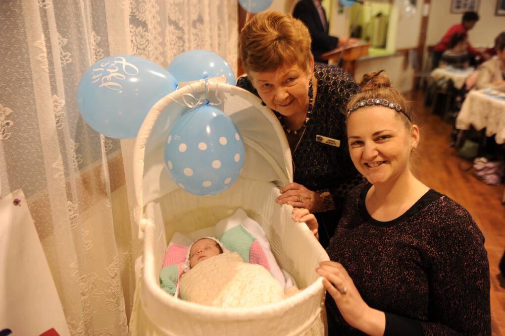 PRECIOUS: Three-week-old Thomas Amor with his mother Louise (right) and Horsham Uniting Church volunteer Janice Merrett. Picture: ALEXANDER DARLING