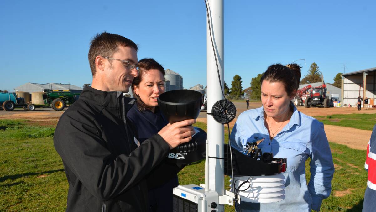 THINGS ARE HAPPENING: Mark Gould, coordinator of the new Internet of Things trial in Birchip, with Agriculture Minister Jaclyn Symes and local farmer Georgie Walsh on Friday. Picture: CONTRIUBTED