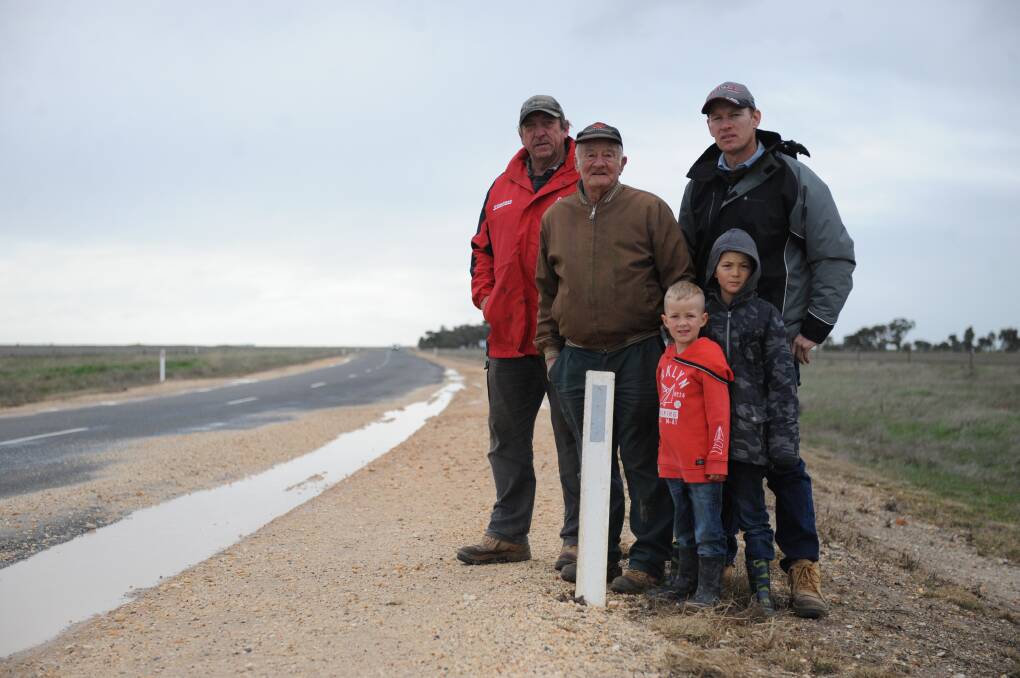 PERSISTENT PROBLEM: Greg Lawson, Tom Blair, Glenn Jenkinson with sons James and Sam at the Blue Ribbon Road through Kalkee. Picture: SONIA SINGHA