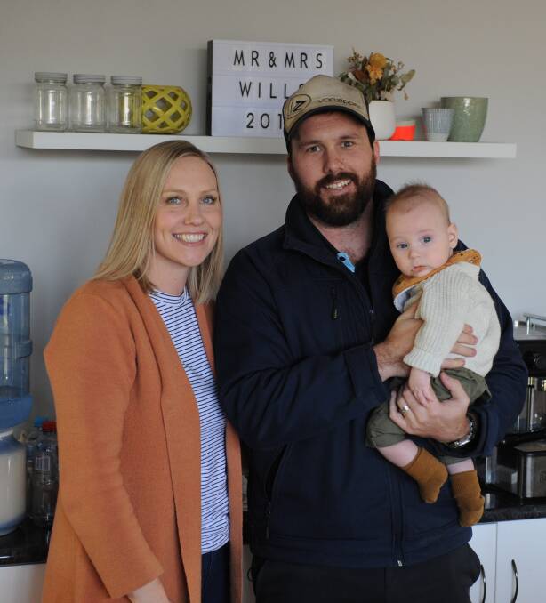 YOUNG FAMILY: Brianna and Brendan Wills with their son Atticus, five months. Picture: ALEXANDER DARLING