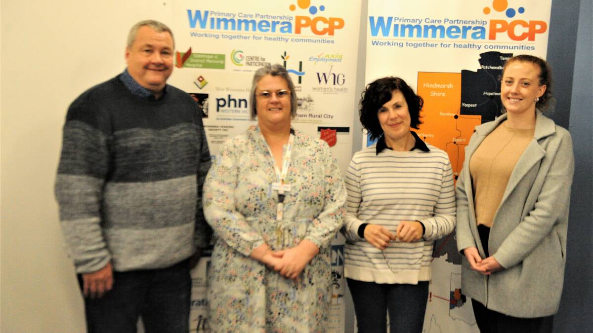 A SMALL BUT EFFECTIVE TEAM: Wimmera Primary Care Partnership executive officer Geoff Witmitz, agency liaison officers Kellie McMaster and Donna Bridge and project officer Holly Noonan. Picture: ALEXANDER DARLING