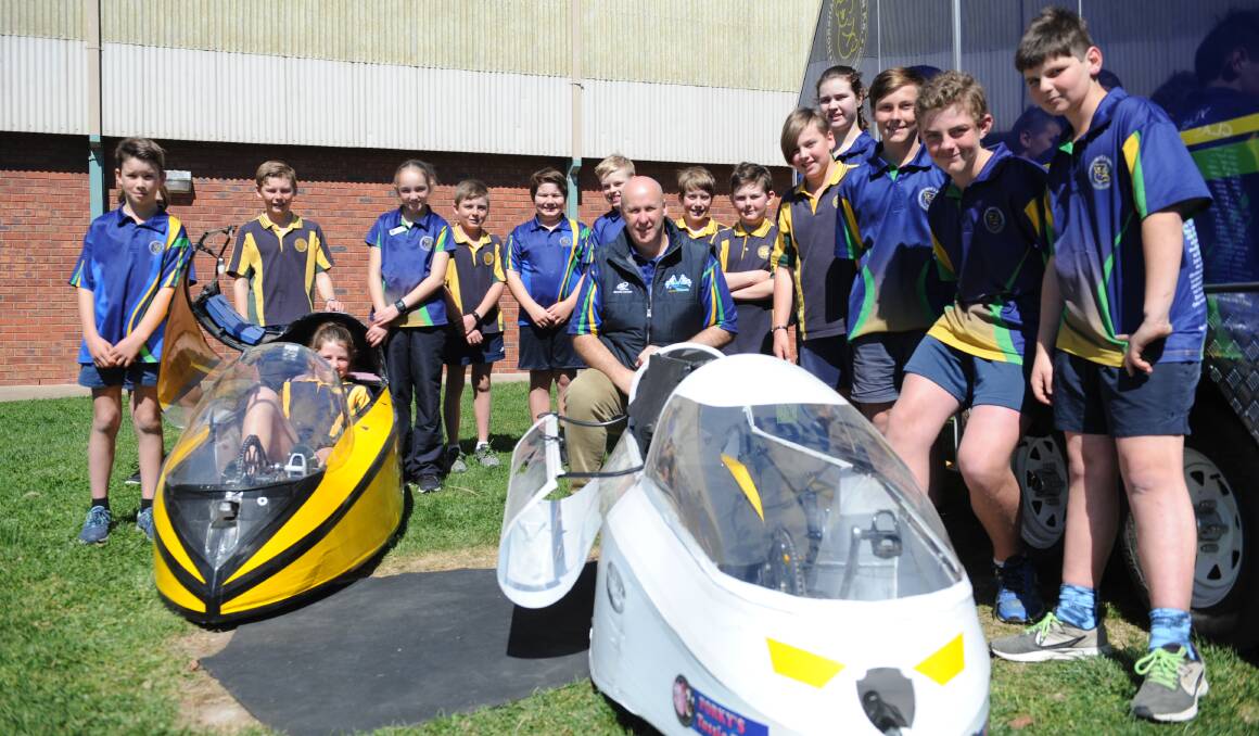 BIG TEAM: Horsham West Haven Primary School students with principal Andrew Parry and their vehicles ahead of the weekend's race. Picture: ALEXANDER DARLING