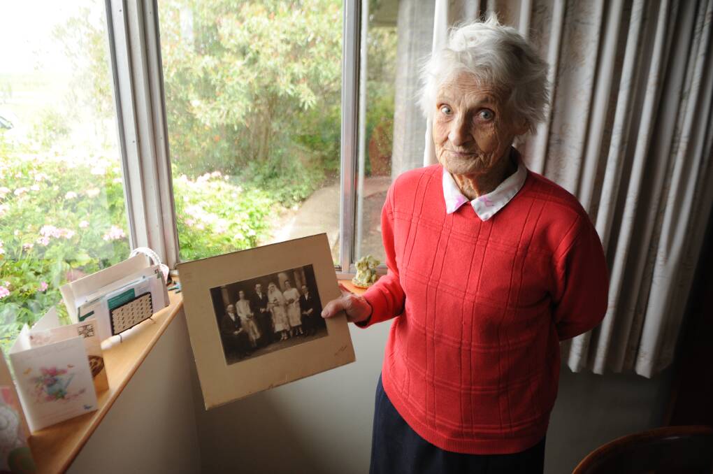 FAMILY TIES: Gwen Fischer with a picture of uncle "Sandy" Mackenzie, who made nets for World War II soldiers. Picture: ALEXANDER DARLING