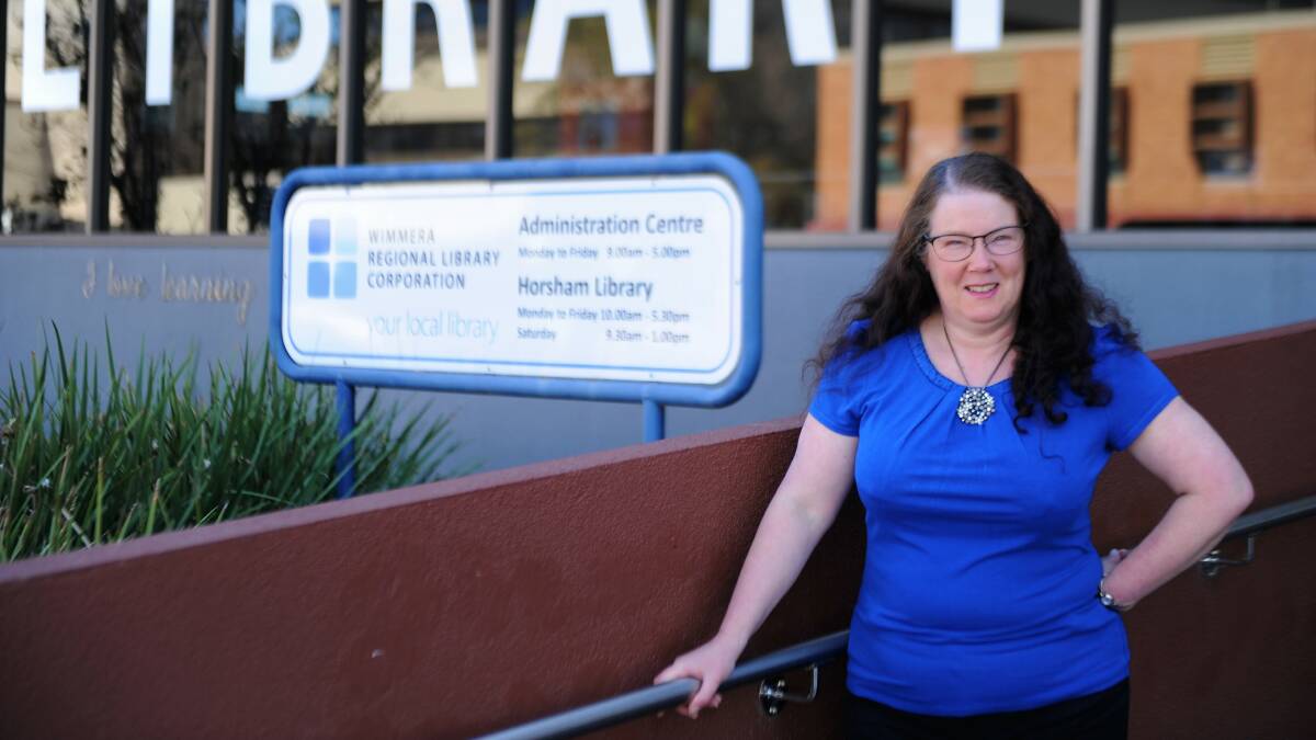 OPENING EARLIER: Wimmera Regional Library Corporation's IT and Marketing manager Leanda Elliott at Horsham Library. Picture: ALEXANDER DARLING
