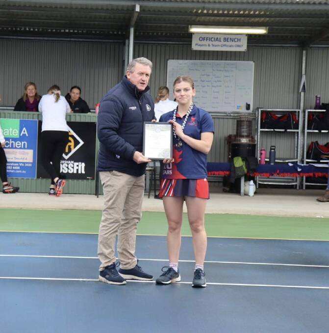 Laharum netballer Sophie Quick with Blue Ribbon Foundation member Les Power. Picture supplied