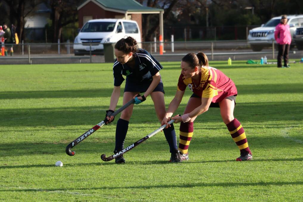 TUSSLE: Yanac's Mikayla Farmers (left) and Warrack's Brooke McMaster play for the ball. Picture: SIMON KING