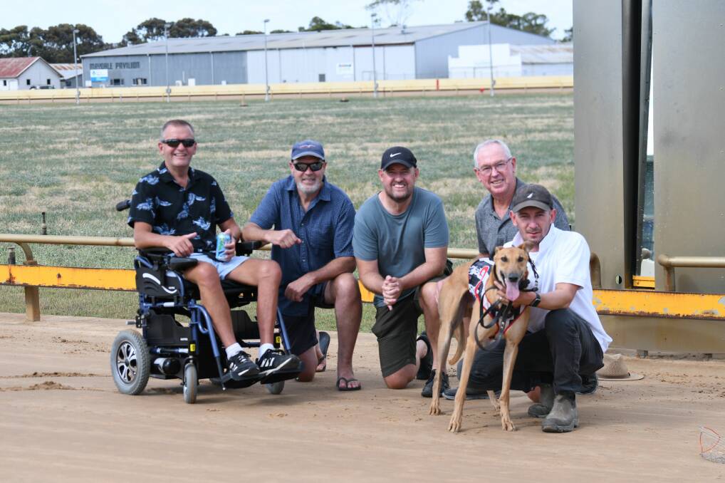 MILESTONE: Mick Hogarth (left) with Ross Carr, David Hogarth, Darrell Heathcote and handler Jye from Team Sharp with Orson Mick. Picture: CONTRIBUTED