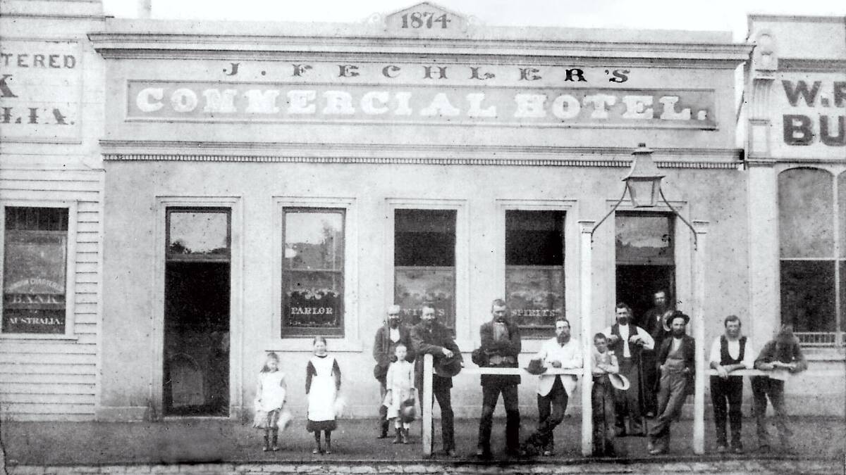 Calmer days: Joseph Fechler (in white coat), staff and family outside the Commercial Hotel, 68 Wilson Street, about 1885. Note acetylene street lamp. Picture: Horsham Historical Society