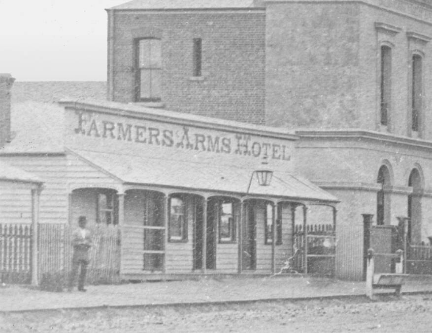 HOTEL: The Farmers Arms Hotel, 50-52 Wilson Street, about 1877, viewed looking north-east. Note the new (1876) National Bank building next door. [Source: HHS 091506 (c)].