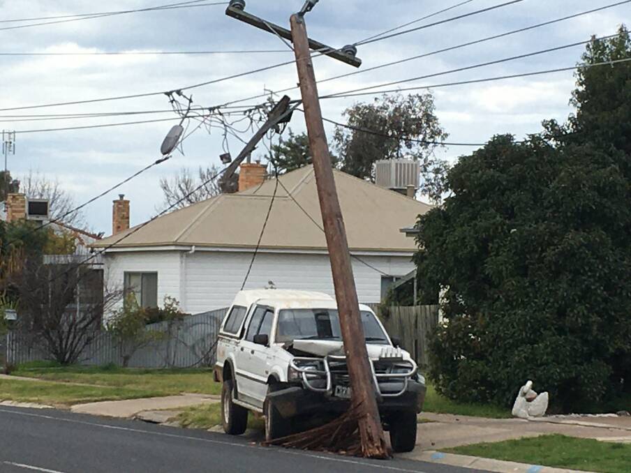 LUCKY: Edith Street is closed after a 4WD collided with a powerpole. Picture: ALEXANDER DARLING
