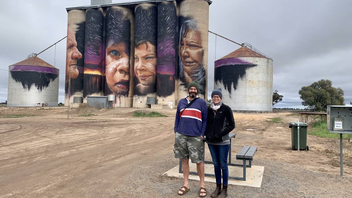 So vivid: Before lockdown, Northcote couple Clint Schipper (left) and Kati Regan toured the Wimmera Silo Art Trail. Picture: Ben Fraser