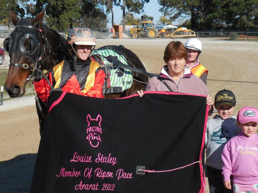 WINNER: Hamilton driver Jackie Barker with Elliminyt owner Sheryl Laird and her children after the win of Shady Dancer in the $7000 Louise Staley, Member For Ripon Pace at Ararat's "Pacing For Pink" race meeting last Sunday. Picture: TONY LOGAN