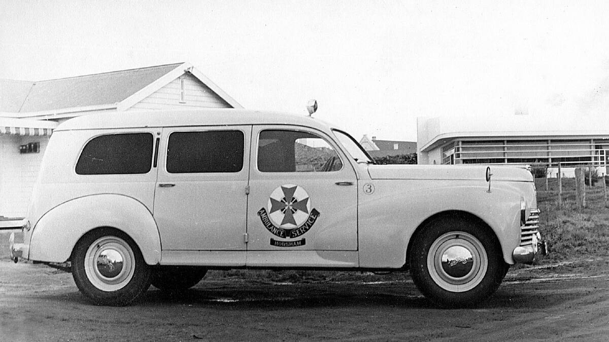 Horsham's first long-distance comfort ambulance, a Peugeot 203 station wagon, outside the original ambulance station, in Baillie Street, just east of Read Street, 1953.
Picture by HHS (013630)