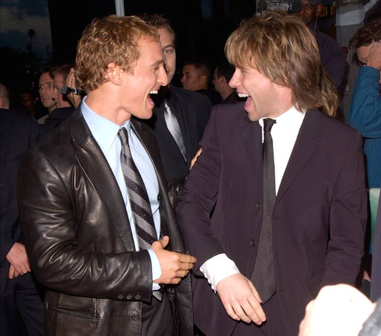 Alright: Matthew McConaughey (left) with Jon Bon Jovi at the premier of U-571. Picture: SHUTTERSTOCK
