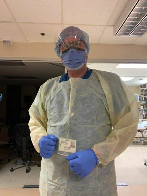 Rugged up: Former Horsham Peter Alt is now working in the USA as a registered nurse. His typical attire for working in ICU. He said the plastic gowns (pictured) are no longer available and he is forced to buy his won N95 mask. Picture: SUPPLIED