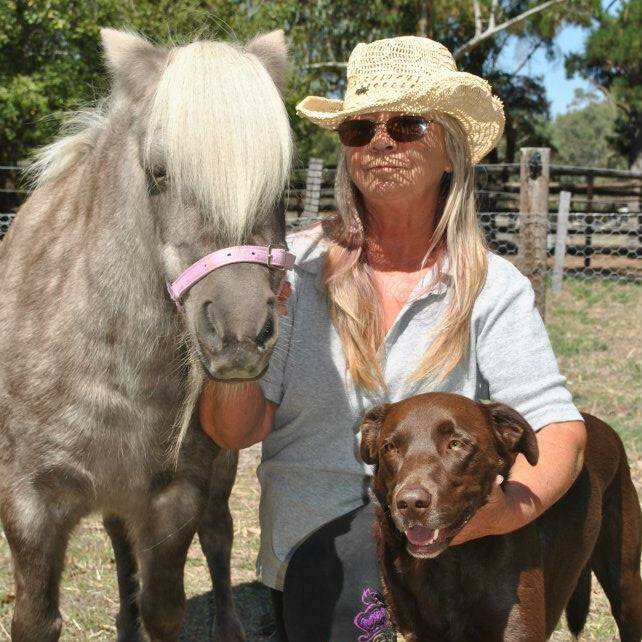 FINDING SOLACE: Di Thorpe with Dolly the horse and kelpie Charly Choklit at their 'slice of heaven' in Apsley, waiting for border restrictions to ease. Picture: CONTRIBUTED