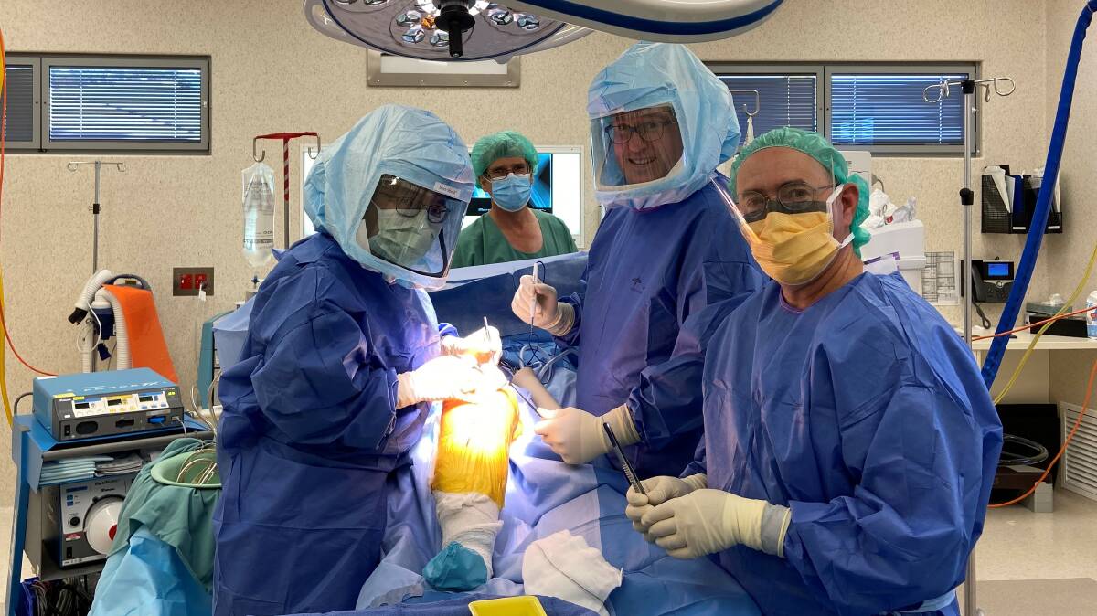 BACK AT IT: Orthopaedic Surgeon Dr Chi Gooi and his team perform knee surgery at West Wimmera Health Service. Picture: CONTRIBUED