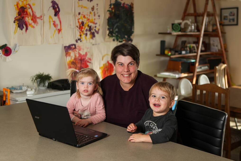 HANDS FULL: Cherie Geyer is a teacher at the Special Developmental School and is working remotely with her two-year-old twins Quinn Geyer-Fox and Owen Geyer-Fox. Picture: Morgan Hancock 