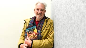 MUST READ: Bendigo author Colin King with his new book 'Deep Down', his third novel featuring Detective Sergeant Rory James. Picture: DARREN HOWE